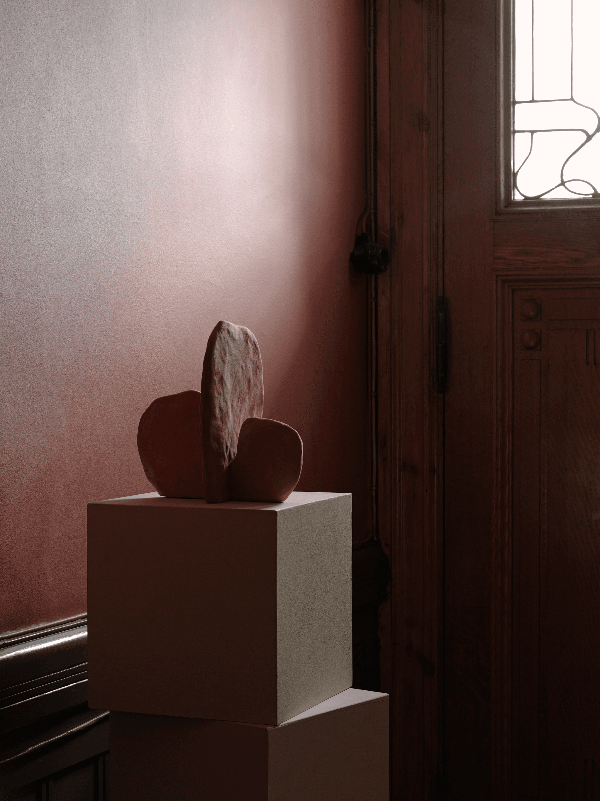 Stunning artwork made in cooperation with Mina Karami, displayed on a podium in a stairwell. Styled by Emma Persson Lagerberg and photographed by Petra Bindel