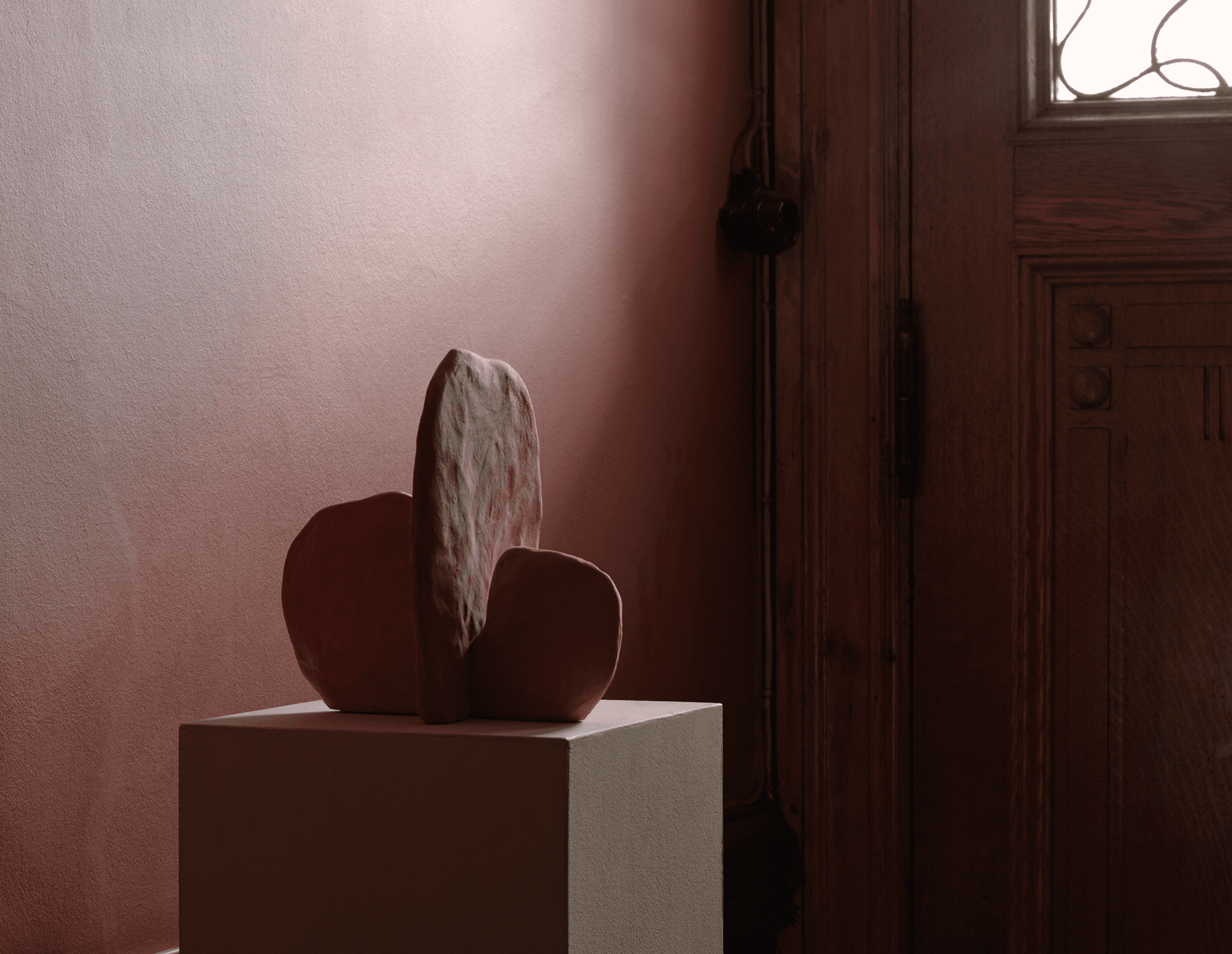Stunning artwork displayed on a podium in a stairwell, styled by Emma Persson Lagerberg and photographed by Petra Bindel